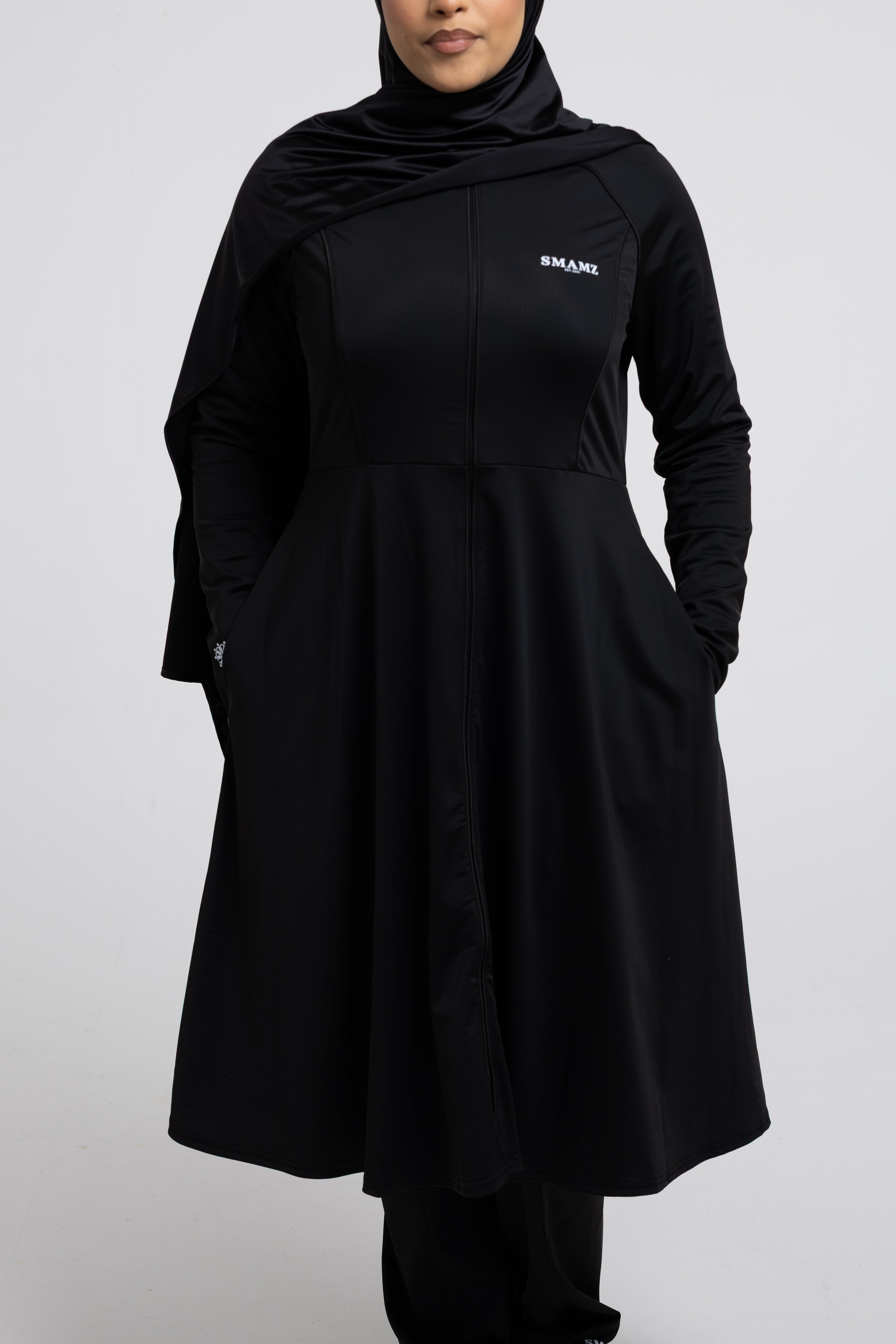 HAYĀ Top long Swimwear Black