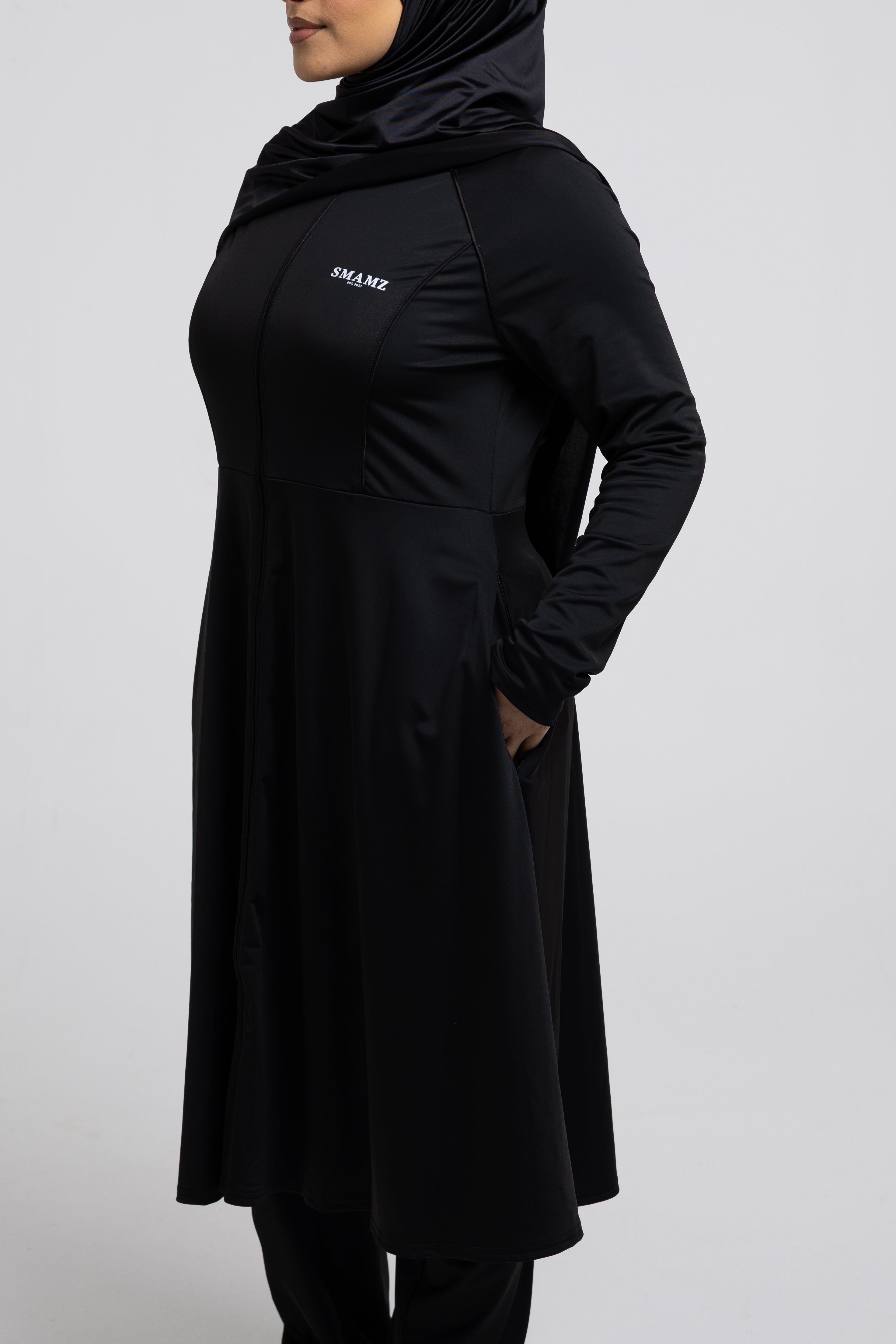 HAYĀ Top long Swimwear Black